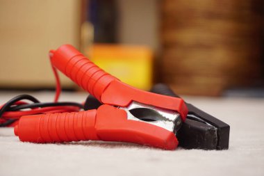 Battery clamps on isolated background close up view