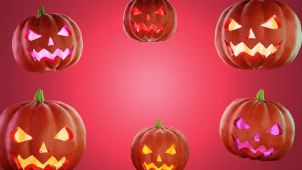 Concetto Halloween. Zucche Jack-o-lanterna incandescenti su sfondo rosso. Copia spazio — Video Stock