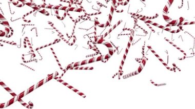 Noel şeker kamışları beyaz arka planda uçar. İzole edilmiş. Yeni yıl tatili.