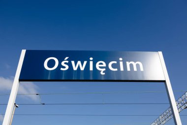 owicim oswiecim smallpoland poland  Auschwitz owicim signboard welcoming to the city Daytime blue sky