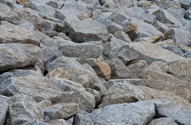 Stones and rocks on the shore. Stone. Background