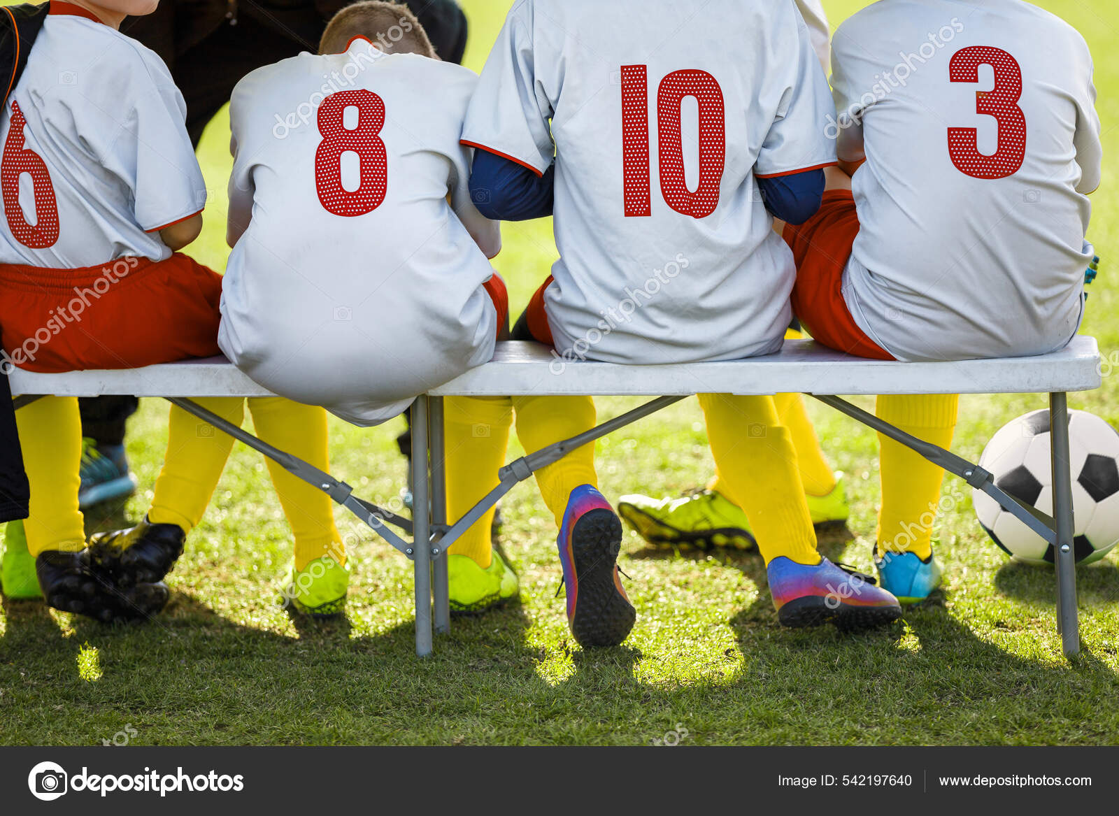 Kids Colourful Sporty Clothes Sitting Team Soccer Bench Boys Football Stock  Photo by ©matimix 542197640