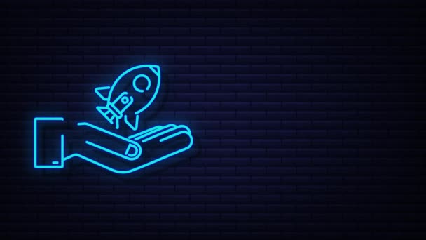 Neon Rocket Start Up Concept in handen. bewegingsgrafiek — Stockvideo