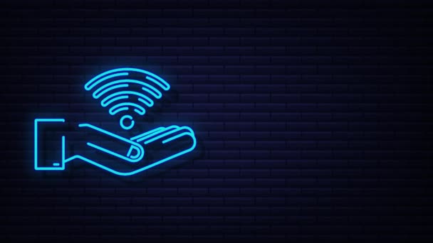 Kostenlose Wifi-Zone Neon-Zeichen in den Händen Symbol. Kostenloses Wifi hier unterzeichnen Konzept. Bewegungsgrafik — Stockvideo