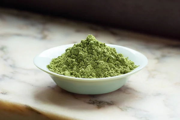 White Vein Sumatra Kratom Powder Natural Plant Based Medicine for Pain Relief and Anti-Anxiety in Dish