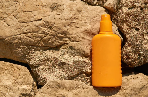 Orange Container Sun Protection Cream Stone Background — Photo