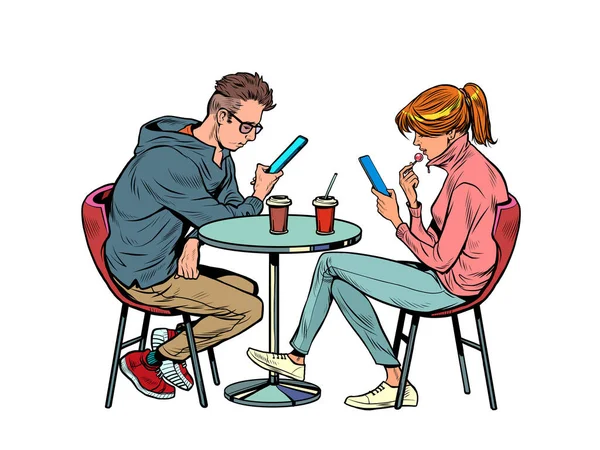 Een koppel op een date in een restaurant kijken naar smartphones en niet praten, eenzaamheid en nieuwe technologieën — Stockvector