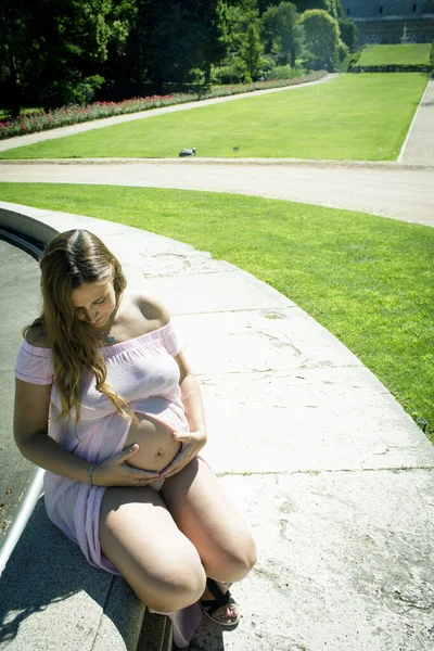 Seven Months Pregnant Woman Sitting She Dressed Transparent Pink Dress — Stock Photo, Image