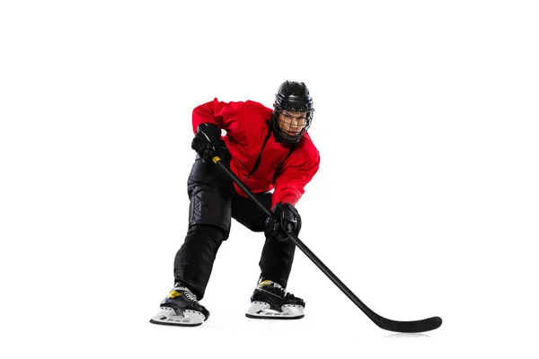 Full-length portrait of woman, professional hockey player training isolated over white background. High concentration — Stock Photo, Image