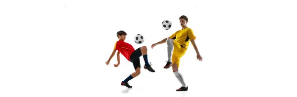 Kolaż młodego chłopca i nastolatka, piłkarze w ruchu, trening izolowany na białym tle — Zdjęcie stockowe
