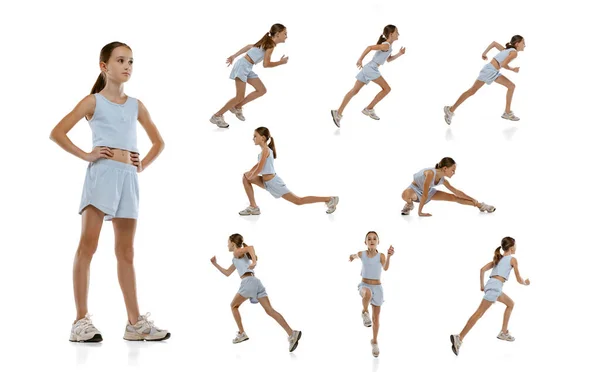 女孩的画像，穿着蓝色运动服训练的青少年，在白色背景上独自奔跑。大学生活 — 图库照片