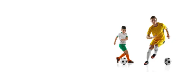 Kolaż młodego mężczyzny i chłopca, piłkarze w ruchu, trening, dryblowanie odizolowane na białym tle — Zdjęcie stockowe