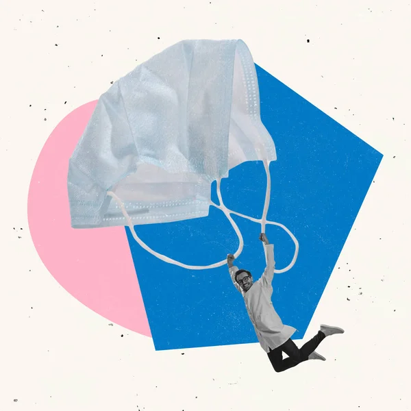 Colagem de arte contemporânea. Homem voando com máscara protetora como em paraquedas. Medidas cautelares — Fotografia de Stock