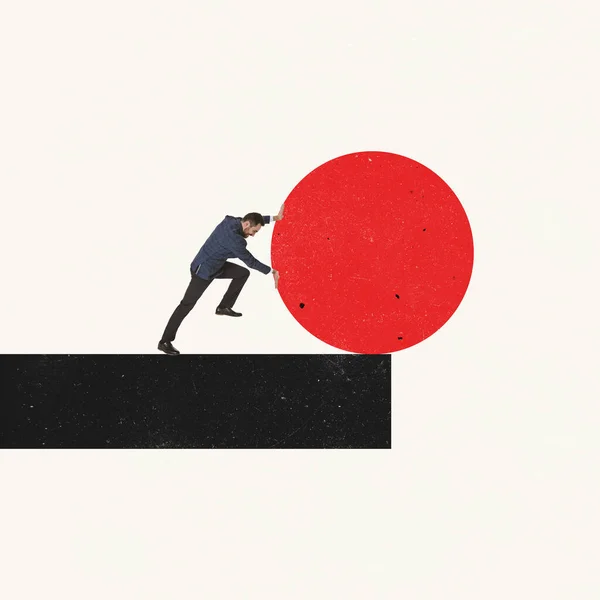 Contemporary art collage. Motivated, hardworking employee pushing heavy ball, overcoming difficulties and challenges — стоковое фото