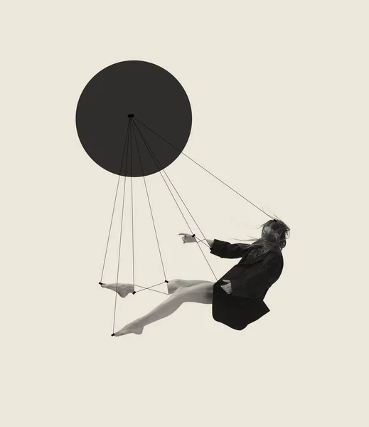 Contemporary art collage with young woman attached to strings and falling down isolated on grey background. Line art design. Concept of classic dance style, art, show, beauty, inspiration