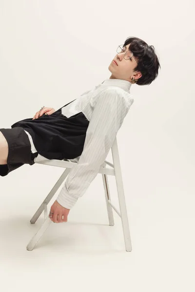 Portrait Young Man Black White Outfit Sitting Chair Posing Isolated — ストック写真