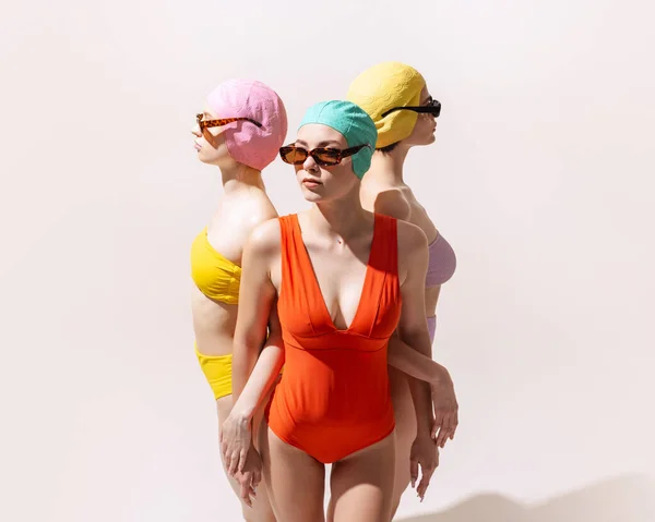 Three Beautiful Women Swimming Suits Sunglasses Standing Together Posing Isolated — Fotografia de Stock