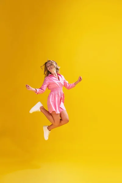 Portrait Beautiful Young Woman Cute Pink Dress Posing Isolated Yellow — Stock Photo, Image