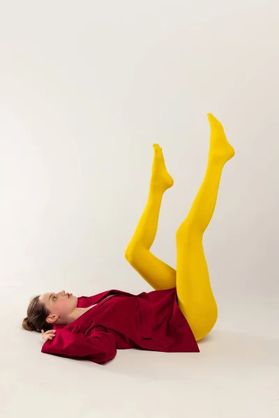 Portrait Young Stylish Girl Yellow Tights Red Jacket Lying Floor — Foto Stock