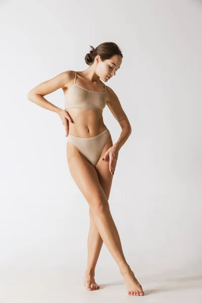 Portrait Slim Tender Woman Posing Beige Underwear Isolated Grey Studio — ストック写真