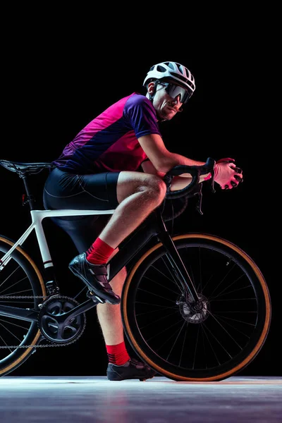 Portrait Man Professional Cyclist Training Riding Isolated Black Studio Background — Stock fotografie
