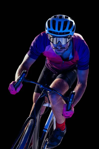 Portrait Man Professional Cyclist Training Riding Isolated Black Studio Background — Foto de Stock
