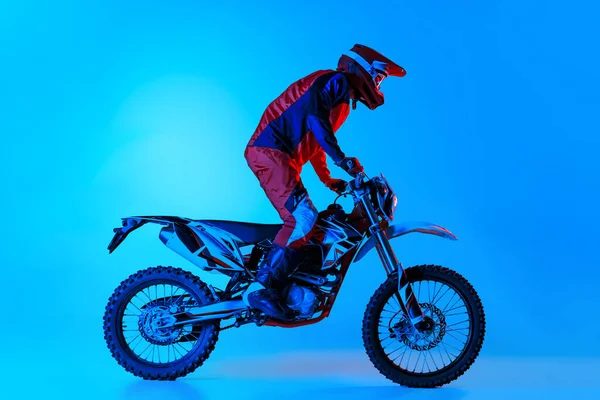 Portrait Young Man Biker Standing Motorbike Riding Isolated Blue Studio — Stockfoto