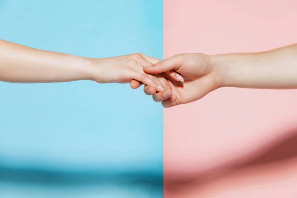 Image Male Female Hands Reaching Each Other Holding Isolated Pink — Foto Stock