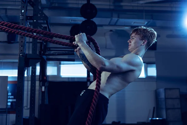 Portrait Muscular Red Haired Man Training Doing Exercises Ropes Isolated — Fotografia de Stock