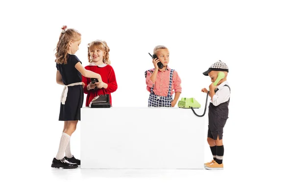 Portrait Stylish Children Retro Clothes Posing Talking Retro Phone Isolated — стоковое фото