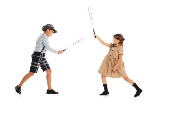 Two Stylish Children Vintage Clothes Playing Badminton Having Fun Isolated — Foto Stock