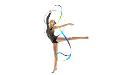 Young beautiful sportive girl, female rhythmic gymnast training with colorful ribbons isolated over white studio background. Concept of action, motion, sport life, competition. Copyspace for ad