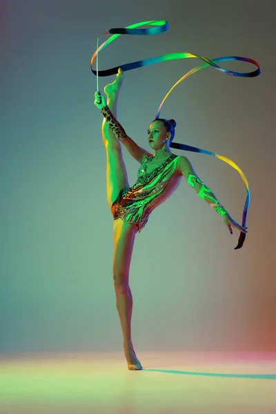 Flexible Young Girl Female Rhythmic Gymnast Training Ribbon Isolated Green — Stockfoto
