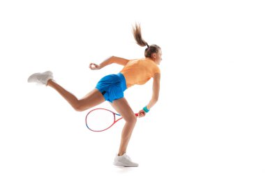 Portrait of young sportive woman, professional tennis player training isolated over white studio background. Concept of sport, health, strength, action, motion, hobby, lifestyle. Copy space for ad