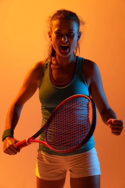 Portrait Woman Professional Tennis Player Training Isolated Orange Studio Background — Stock Fotó