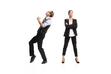 Portrait of man, office manager cheerfully dancing near woman, employee isolated over white background. Successful deal. Concept of business, office lifestyle, success, ballet, career, expression, ad