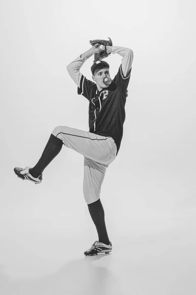 Young Man Baseball Player Pitcher Bubblegum Playing Serving Ball Black — 图库照片