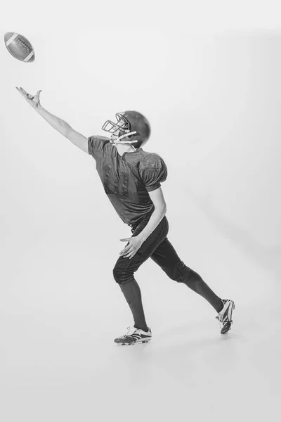 Portrait Young Man American Football Player Posing Throwing Ball Black — Zdjęcie stockowe