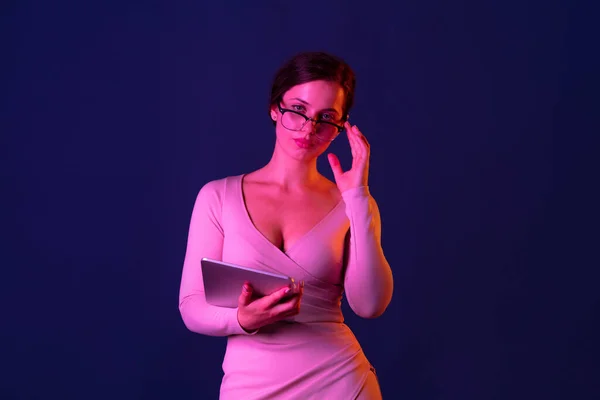 Young Beautiful Woman Posing Stylish Dress Glasses Tablet Isolated Blue — Foto de Stock