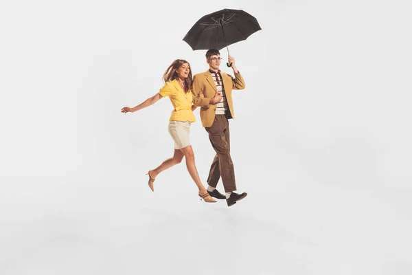 Portrait Young Stylish Couple Man Woman Walking Umbrella Isolated White — Foto de Stock