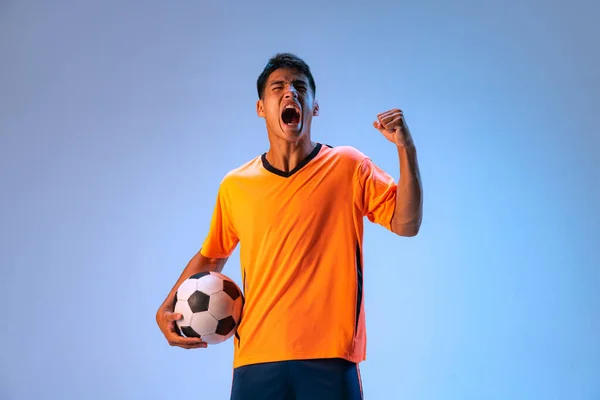 Portrait Young Emotive Man Motivated Football Player Uniform Ball Posing — Zdjęcie stockowe