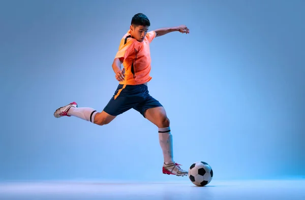 Portrait Young Man Professional Football Player Motion Training Dribbling Ball — Foto de Stock