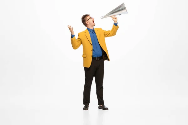 Portrait Young Man Stylish Yellow Jacket Shouting Megaphone Isolated White — Stock Fotó