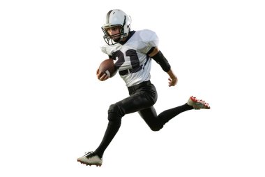 Dynamic portrait of sportive man, american football player in uniform playing, training isolated over white background. Concept of active life, team game, energy, sport, competition. Copy space for ad