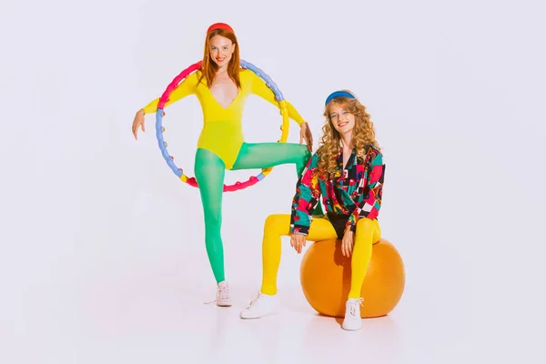 Portrait Stylish Young Girls Bright Clothes Doing Fitness Posing Isolated — Fotografia de Stock