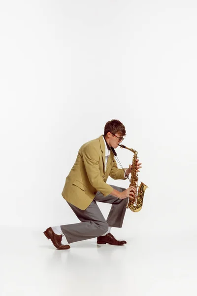 Portrait Young Man Stylish Yellow Jacket Playing Saxophone Isolated White — Foto de Stock
