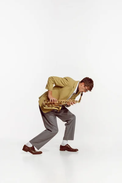 Portrait Young Man Stylish Yellow Jacket Playing Saxophone Isolated White — Foto de Stock
