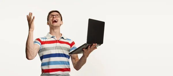 Portrait Young Man Glasses Cheerfully Laughing Holding Laptop Isolated White — Stock Photo, Image