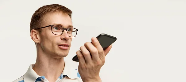 Portrait Young Man Glasses Posing Recording Voice Message Isolated White — Stock Photo, Image