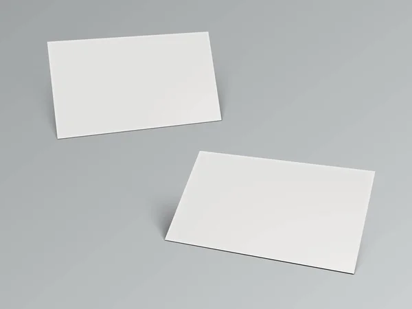 Zwei leere 3D-Visitenkarten mit Schatten auf Grau — Stockvektor